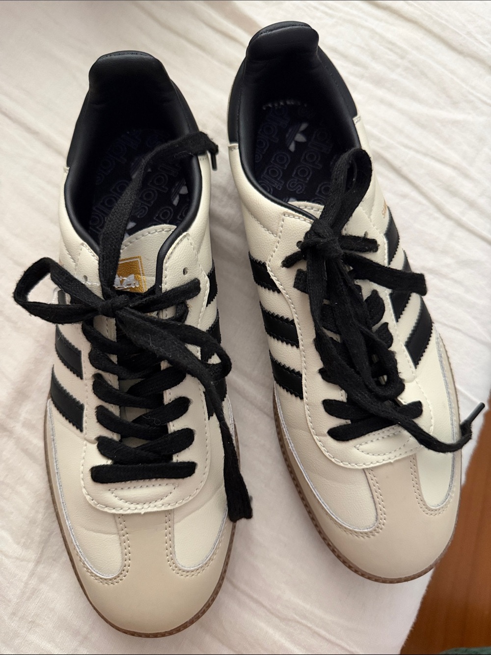 adidas Men’s White and Black Classic Leather Sneakers